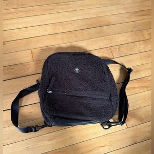 Ivivaa black Sherpa backpack